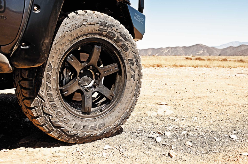 Rays Gram Lights 57JX6 rims in 18x8-inch sizing are mounted with Toyo Tires' all-new Open Country R/Ts.