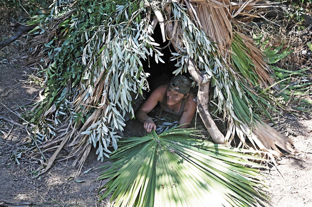 After crawling inside the shelter, a large palm frond can be used to cover the entrance.