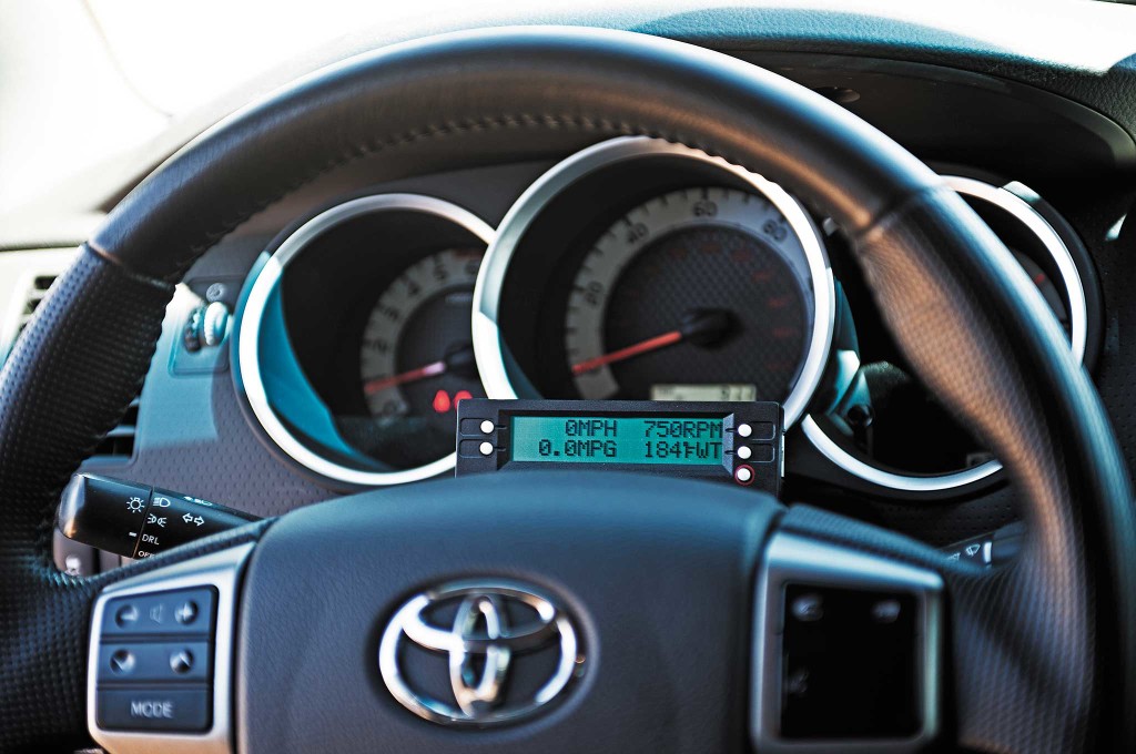 A Scan Gauge II monitors the vehicle's performance and is programmable to display information, such as trip data, transmission temperature, fuel economy, engine speed, among other statisti