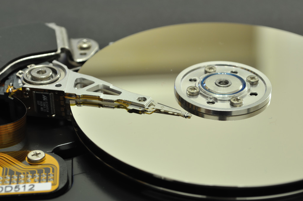 The internal platter of a computer hard drive is fragile, but can store decades of precious data.