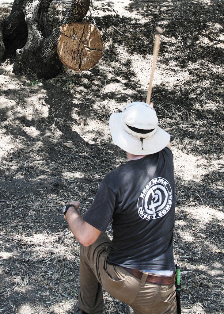The key to success is practice. Learn to swing or throw your weapon with precision, and if you ever need to use it to defend yourself, it'll already be second nature. Different stances, such as over-the-head and kneeling, can help improve the accuracy of thrown weapons, like this tomahawk. 