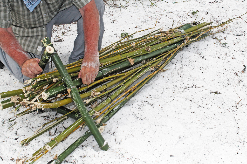 The author fashions a fish trap out of bamboo. As a passive form of fishing, the trap funnels both bait fish and larger swimmers.