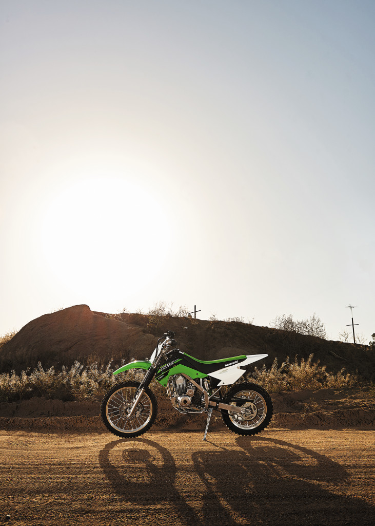 The Kawasaki KLX 140 is a small-capacity off-road motorcycle weighing in at only 210 pounds, ready to ride. Its light weight makes it ideal for learning how to ride a motorcycle in the dirt and over obstacles that you may encounter while fleeing the city.