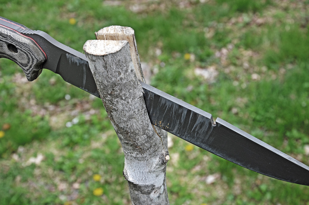 splitting-wood-with-large-knife