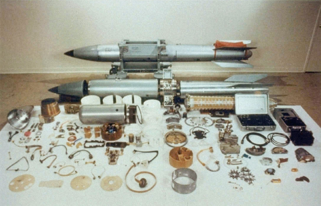 A B-61 nuclear bomb, with its PAL module seen in a metal case on the right.