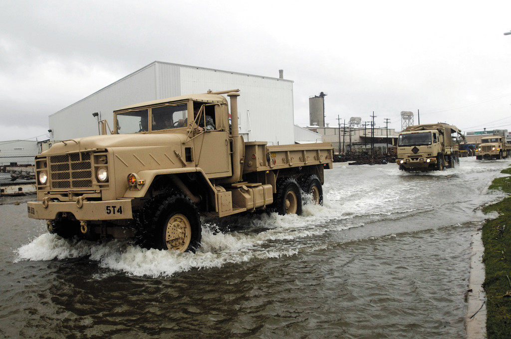 military-trucks-driving-through-water