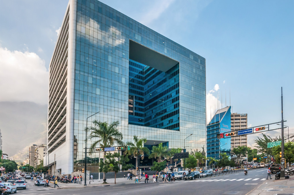 The glistening Parque Cristal, an 18-story office building located in Caracas. Source: Wikipedia