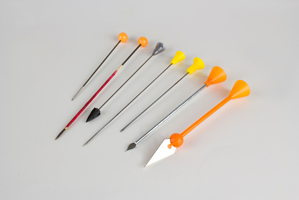 Modern blowgun darts have mild steel or spring steel shafts and molded plastic beads or cones to provide a seal in the 'gun's bore.