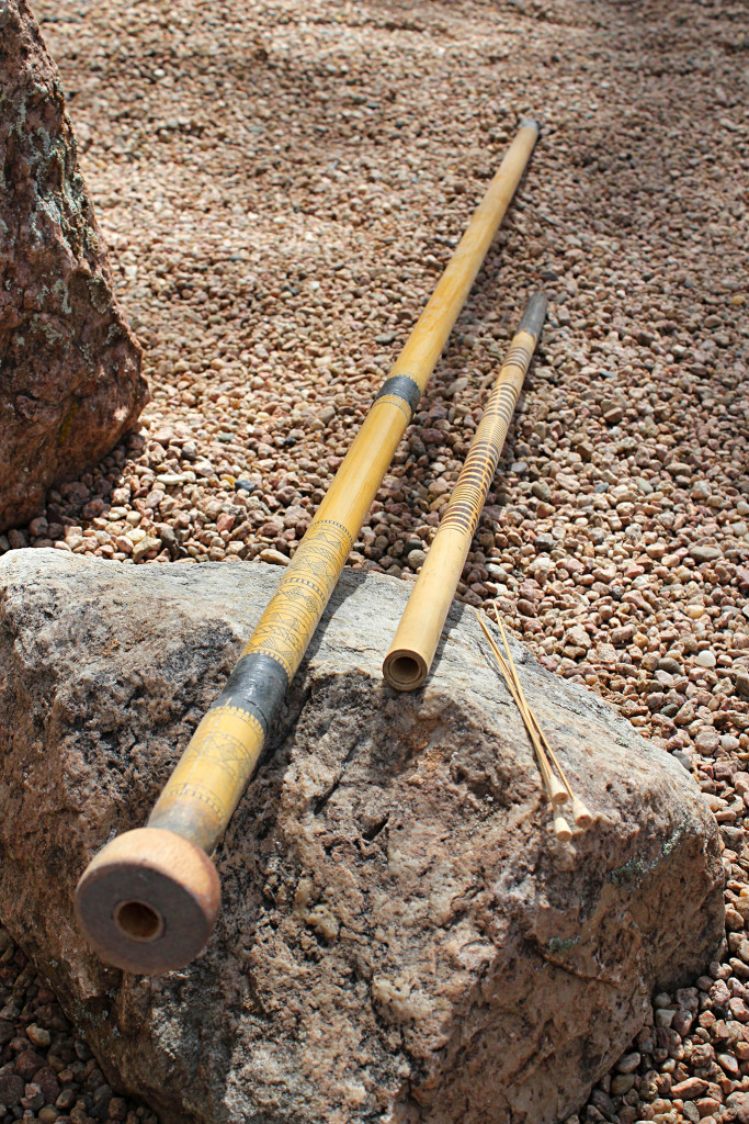 Two traditional blowguns, from Malaysia (with mouthpiece on left) and the Philippines. Their darts consisted of thin bamboo shafts with 