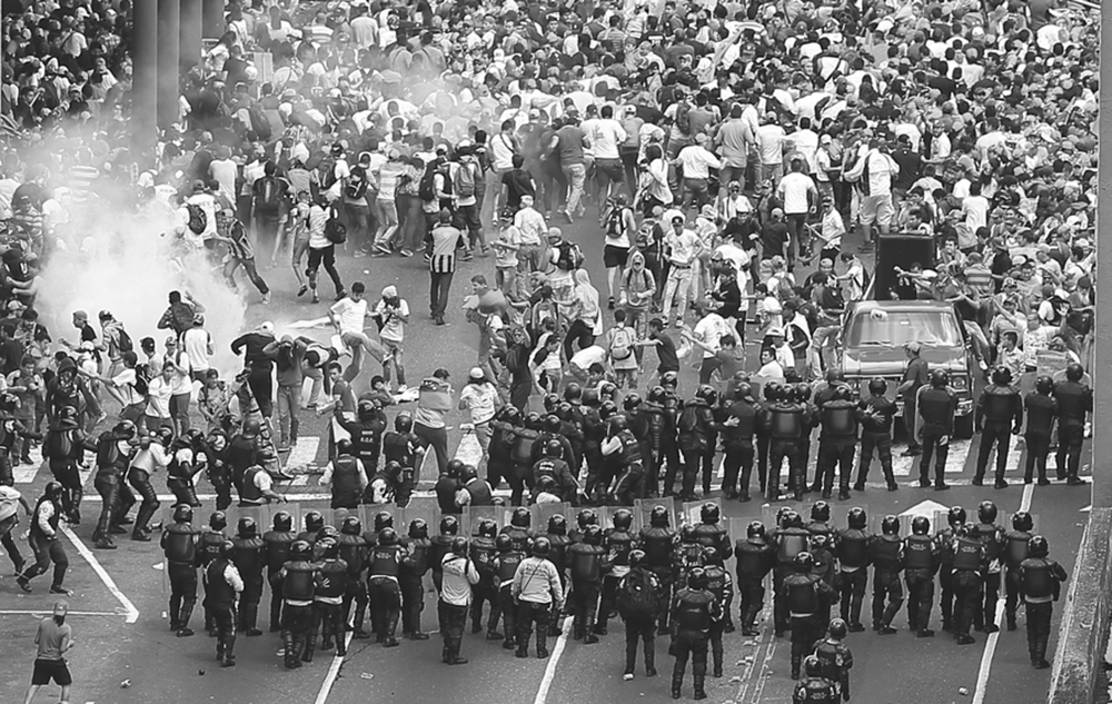 Civil unrest protest riot police city 2