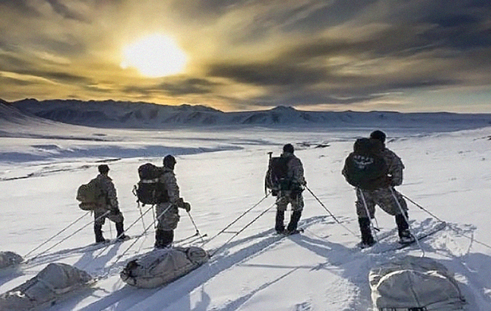 Arctic warriors from U.S. Army Alaska’s Northern Warfare Training Center survey the terrain near Galbraith Lake, Alaska March 22, 2016. The team from NWTC skied 36 miles in three days testing their capabilities in arctic conditions. (Photo by Sgt. 1st Class Adam McQuiston)
