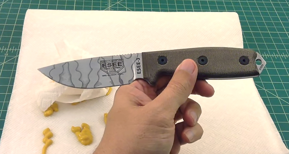 In the video linked above, YouTuber TheSmokinApe acid-etches an ESEE blade with mustard. Yum.
