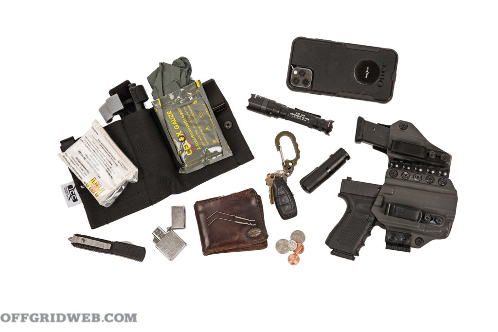 edc belt gear flat lay