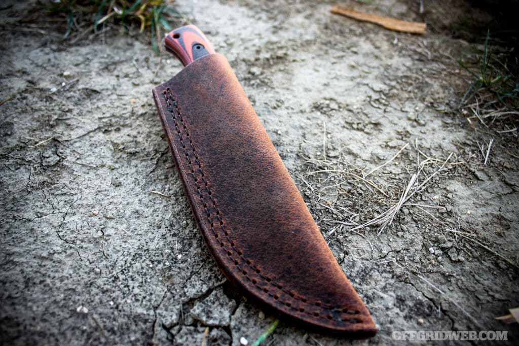 image of bruin in a traditional hunting knife fixed blade sheath by badger claw outfitters.